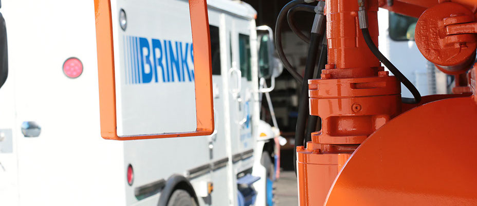 Photo of a white brinks delivery truck